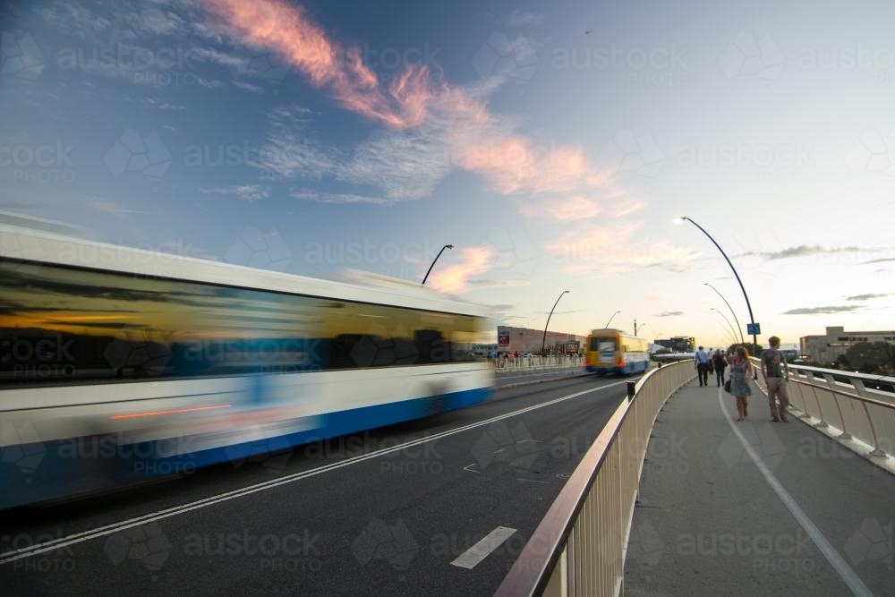 blurry bus travelling on a bridge - Australian Stock Image