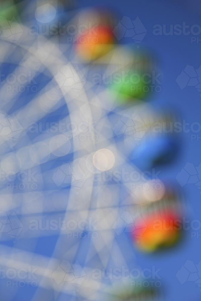 Blurry image of a ferris wheel - Australian Stock Image