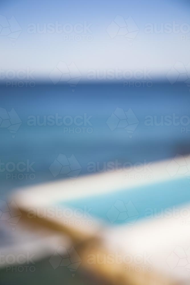 Blurry image of a swimming pool and ocean at bondi - Australian Stock Image