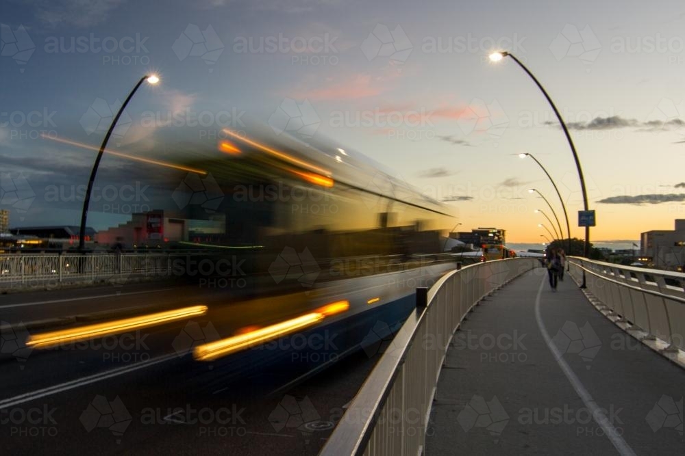 blurry image of bus on its way to the city - Australian Stock Image