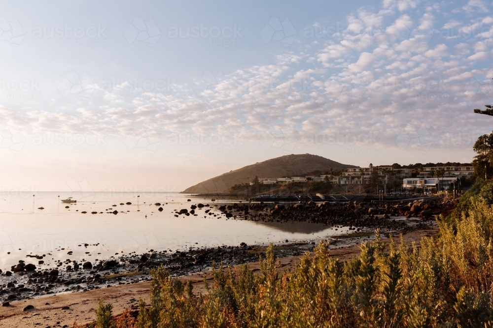 Boat leaving early morning from the Bluff Victor Harbor - Australian Stock Image