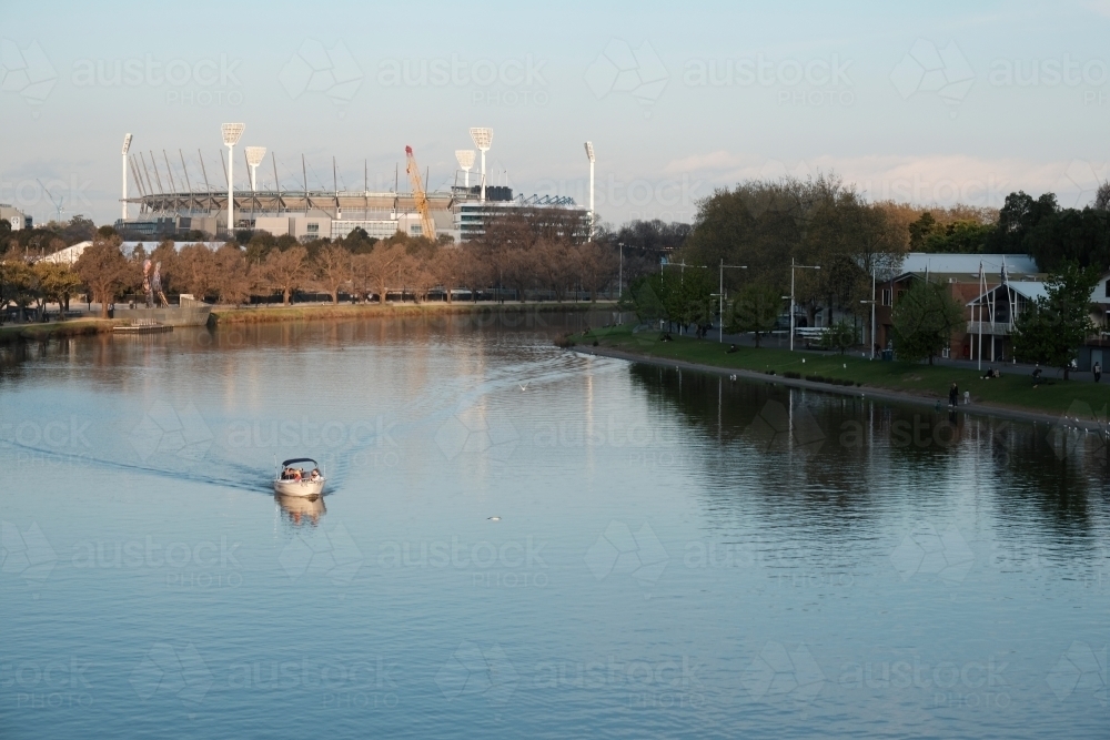 Boat on The Yarra with MCG in Background - Australian Stock Image