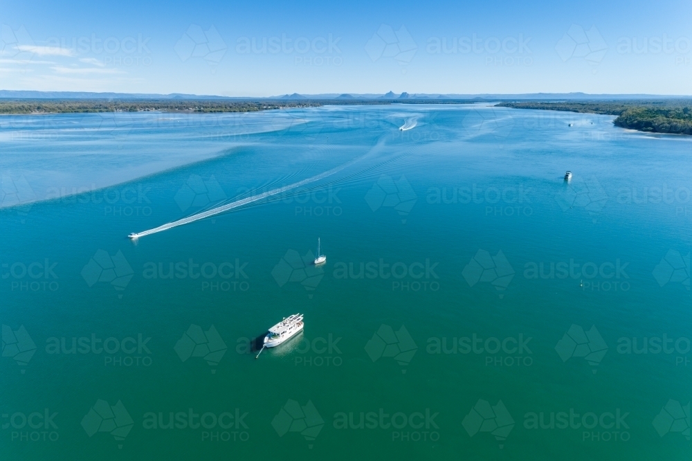 Boating on Pumicestone Passage estuary. - Australian Stock Image