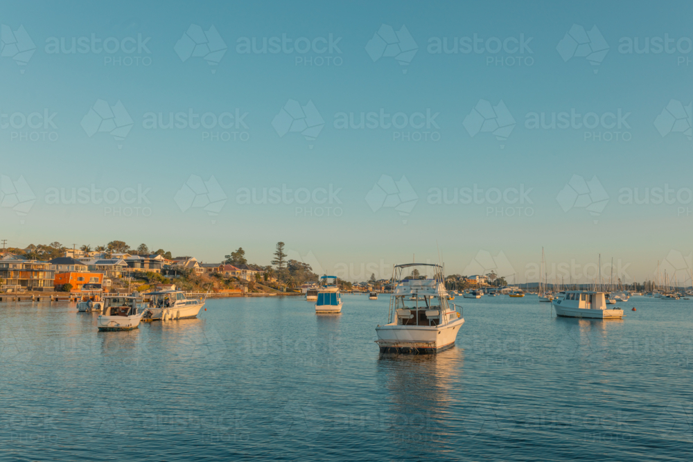 Boats anchored on Lake Maquarie at Belmont NSW - Australian Stock Image