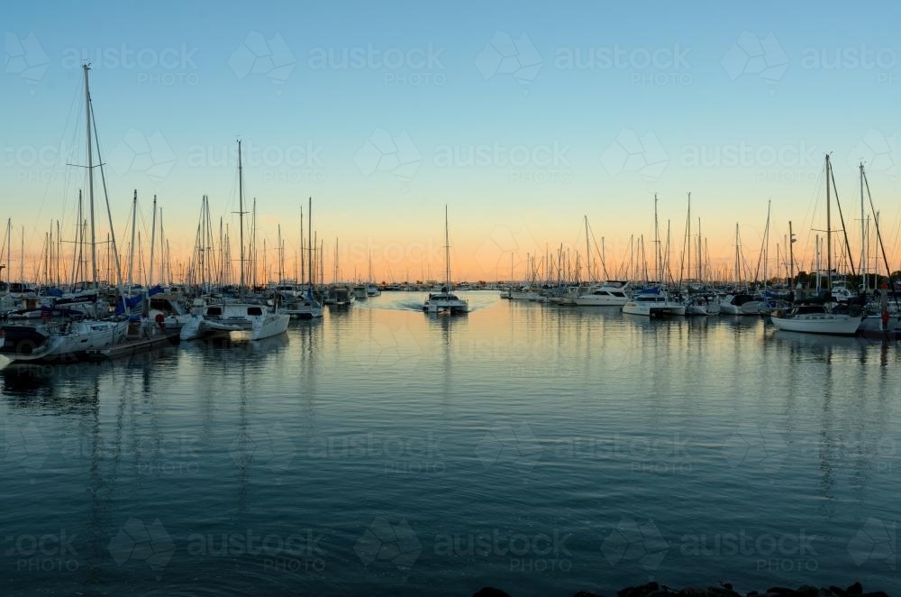 Boats and yachts in the marina at sunset - Australian Stock Image