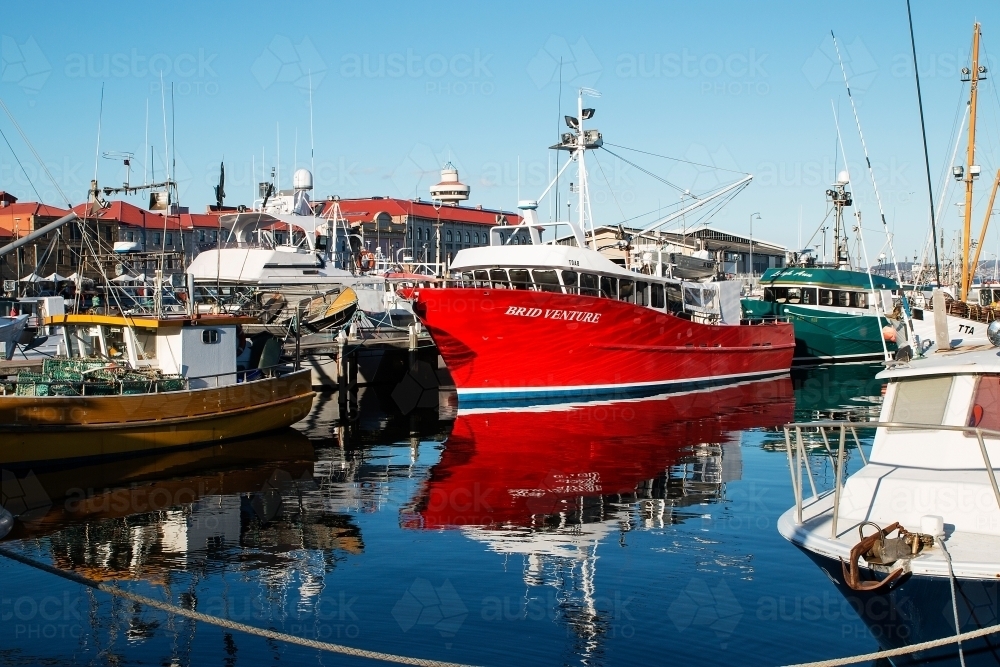 boats moored at docks - Australian Stock Image