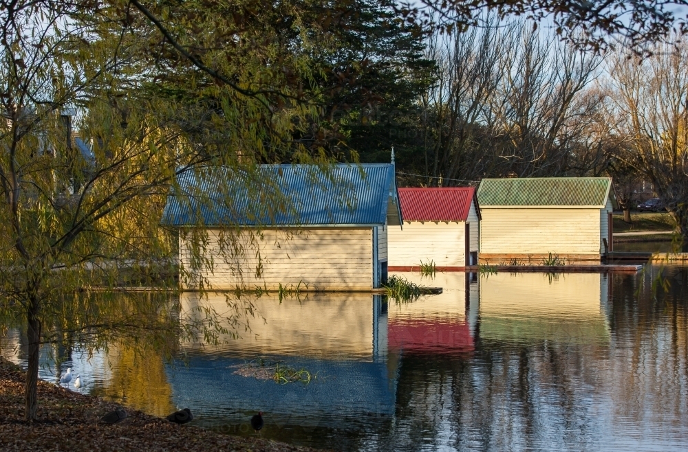 Boatsheds on lake - Australian Stock Image