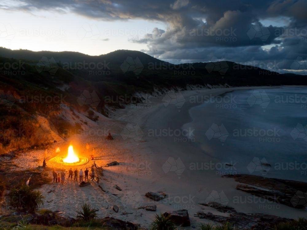 Bonfire on the beach in early evening - Australian Stock Image