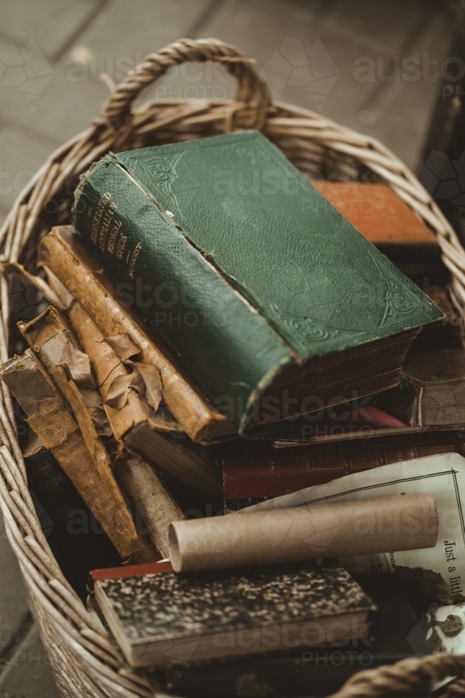 books in a basket - Australian Stock Image