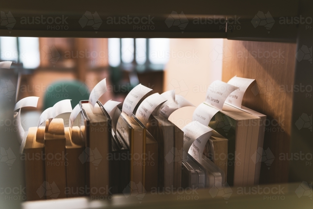 Books on hold in the library. - Australian Stock Image