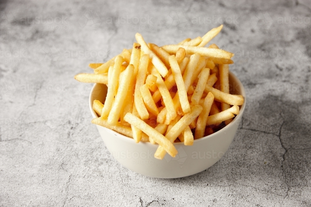 image-of-bowl-of-french-fries-austockphoto