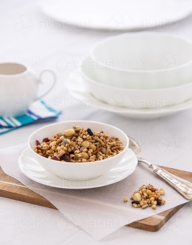 Bowl of organic Granola served at a table - Australian Stock Image