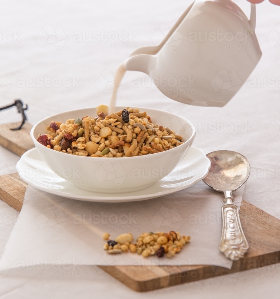 Bowl of organic Granola served at a table - Australian Stock Image