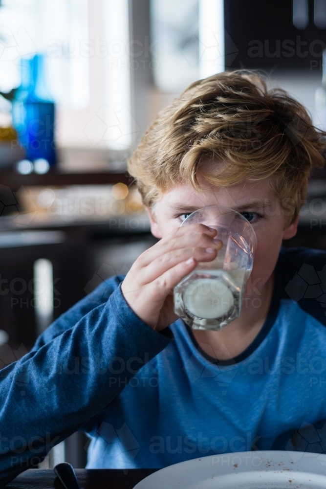 boy drinking milk - Australian Stock Image