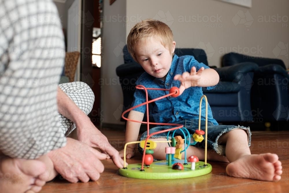 Boy playing with an Educational Toy - Australian Stock Image