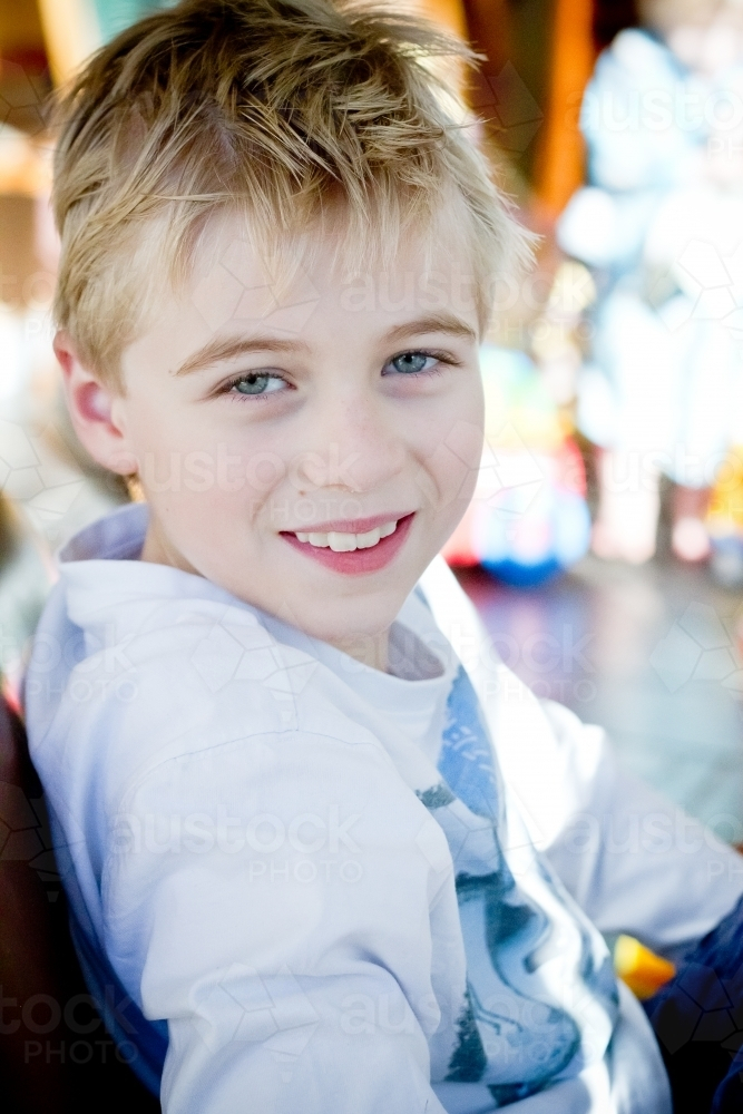 Boy with blonde hair smiling - Australian Stock Image