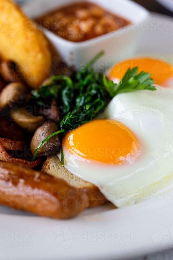 Image of Breakfast dish with fried egg and sausage - Austockphoto
