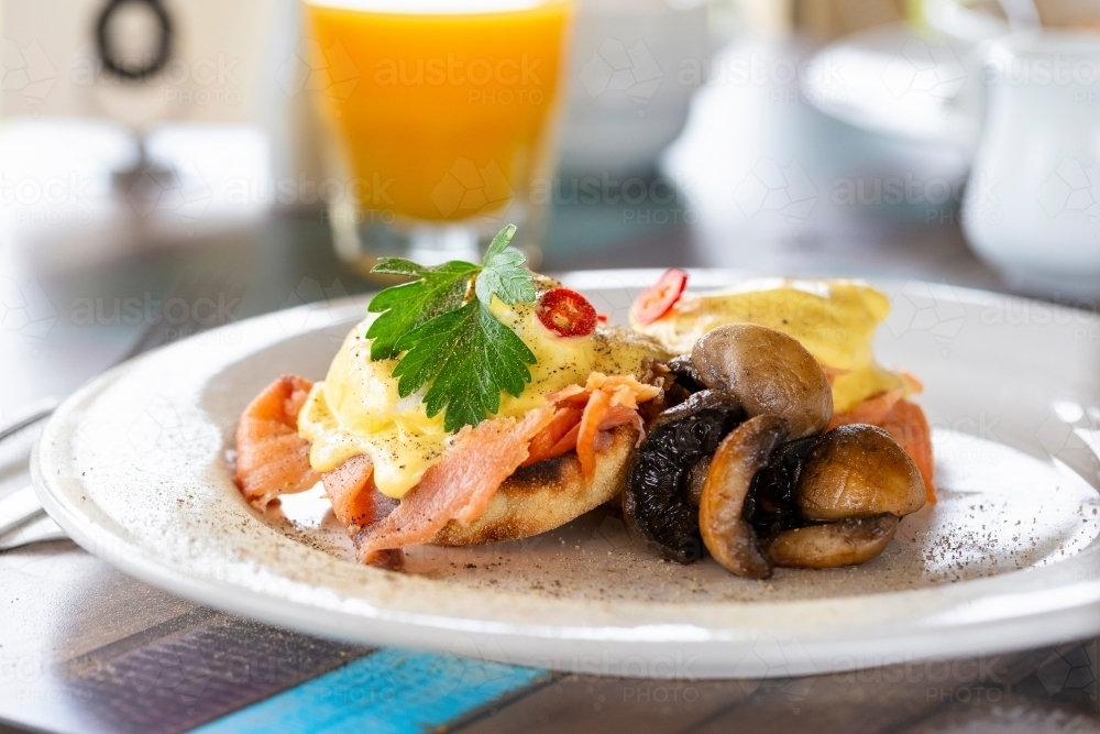Breakfast dish with scrambled egg in restaurant - Australian Stock Image