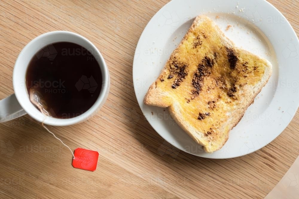 breakfast of vegemite on toast and a cup of tea - Australian Stock Image