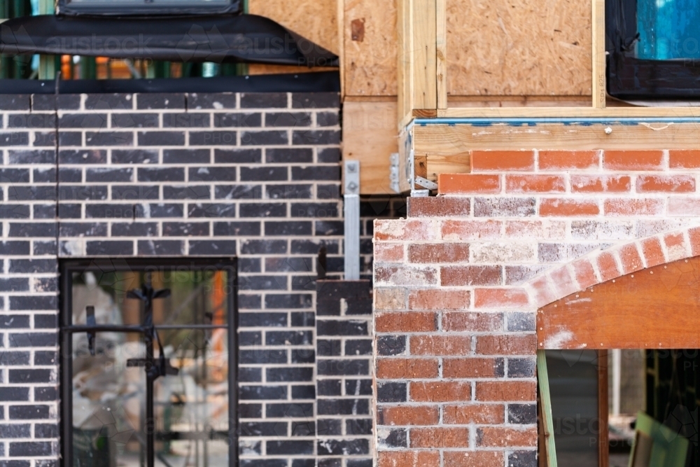 bricks and timber detail of unfinished house on building site - Australian Stock Image
