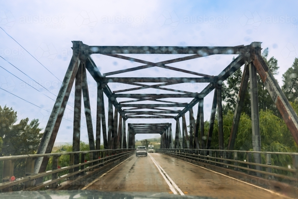 Bridge crossing in regional New South Wales on rainy day - Australian Stock Image