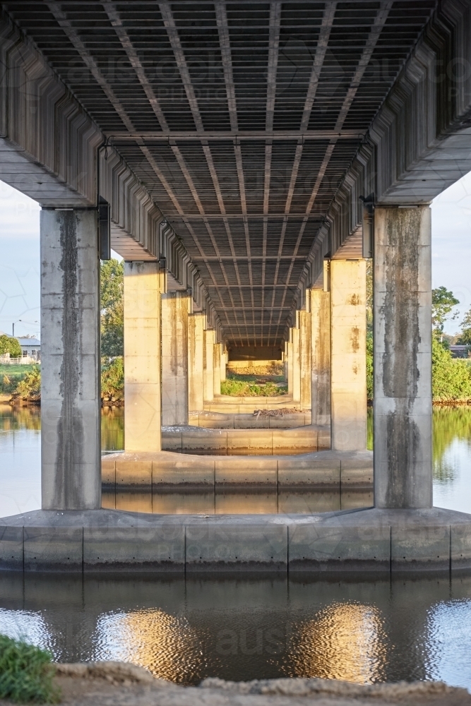 Bridge over river on dusk - Australian Stock Image
