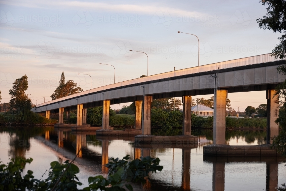 Bridge over river on dusk - Australian Stock Image