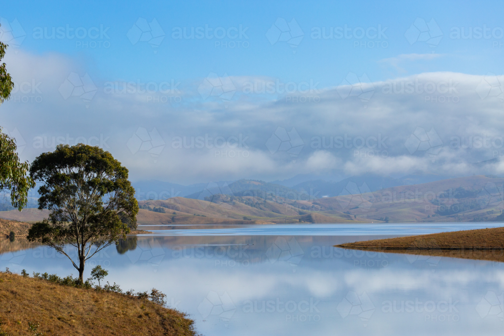 Bright scenery of valley with water supply lake in the Hunter Valley St Clair area - Australian Stock Image