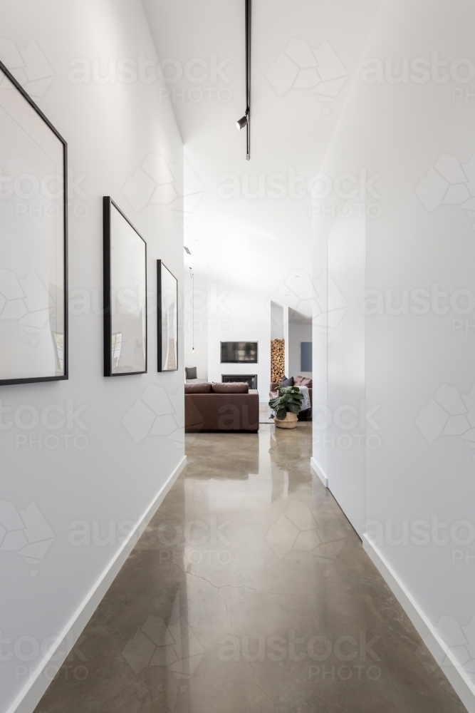 Bright white contemporary new home entrance hall to living room - Australian Stock Image