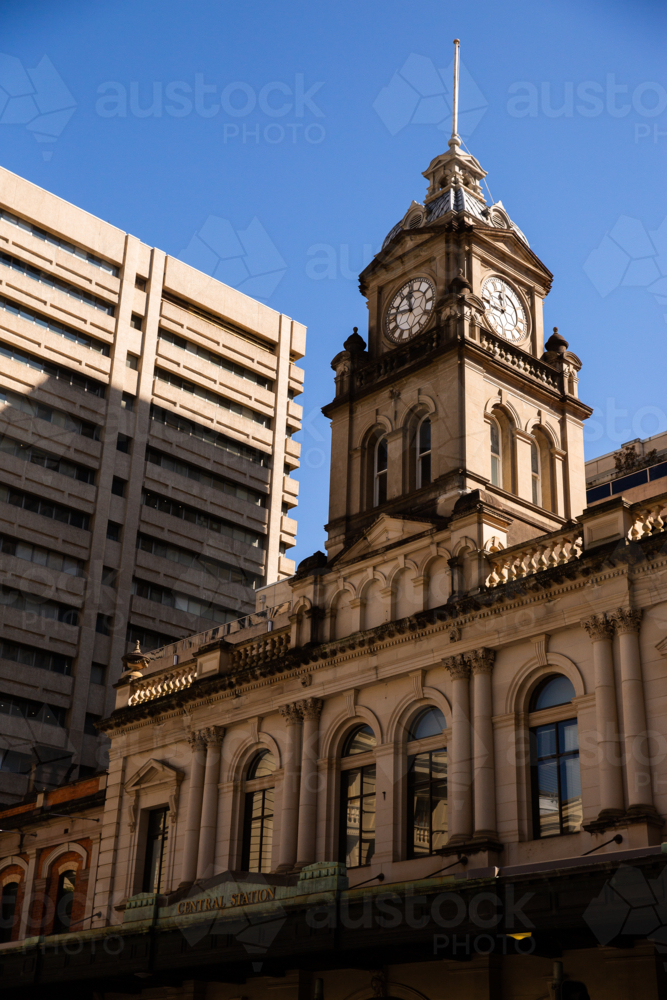 Brisbane central station clock tower and reflection in the arched windows - Australian Stock Image