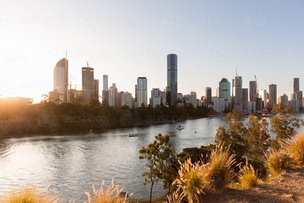 Brisbane city at sunset with golden light - Australian Stock Image
