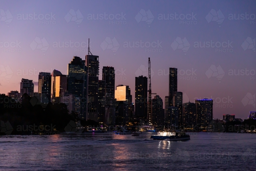 Brisbane City, river and ferry after dusk - Australian Stock Image