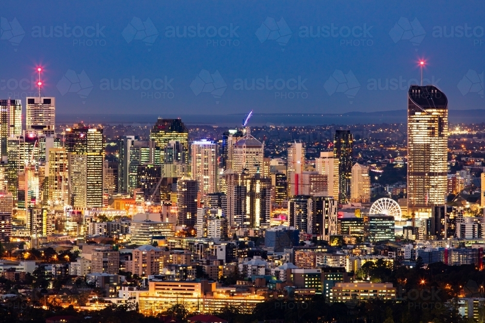 Brisbane city skyline at dusk as seen from Mt Coot-tha. - Australian Stock Image