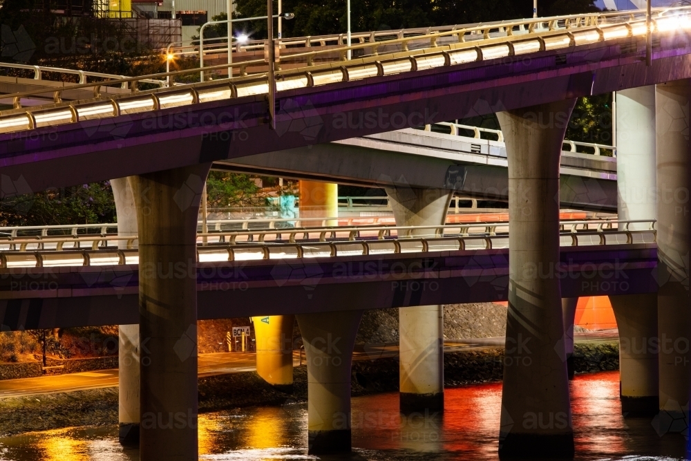 Brisbane's Riverside Expressway along the Brisbane River at night. - Australian Stock Image
