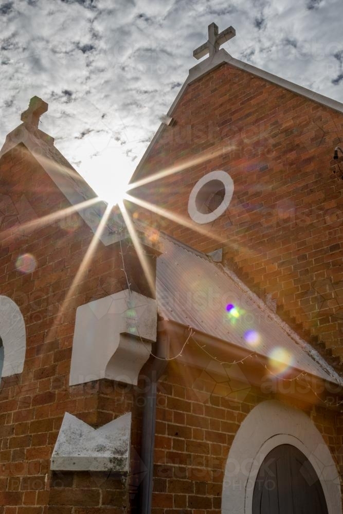 Broke Fordwich Country Church with sunlight shining over the roof - Australian Stock Image