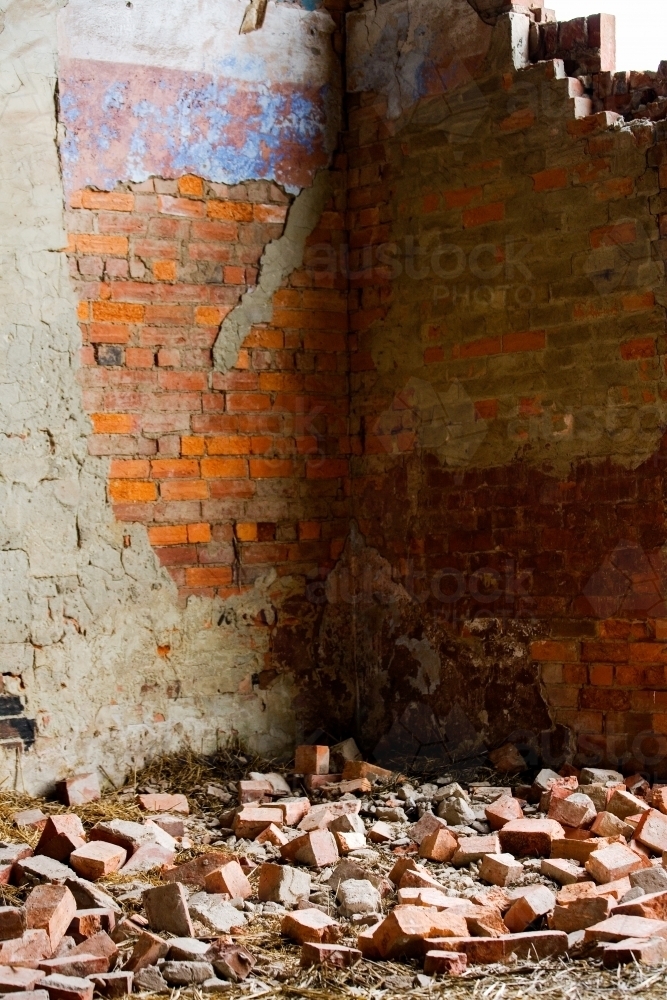 Broken wall and bricks of an old building - Australian Stock Image