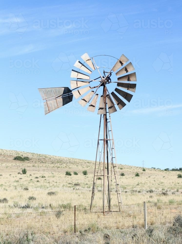Broken Windmill in Country Setting - Australian Stock Image