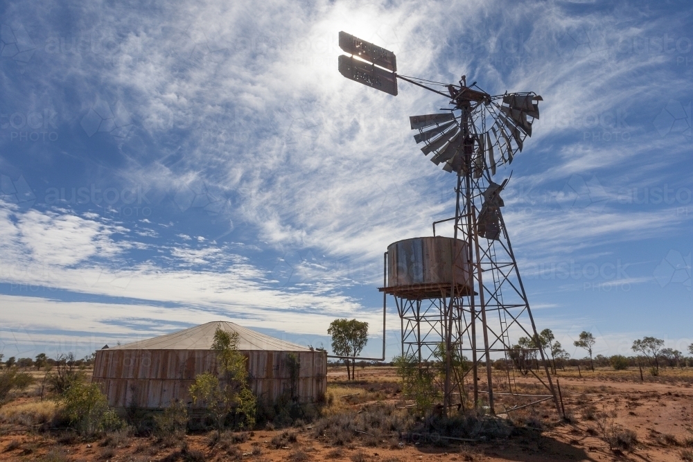 Broken windmill in remote paddock - Australian Stock Image