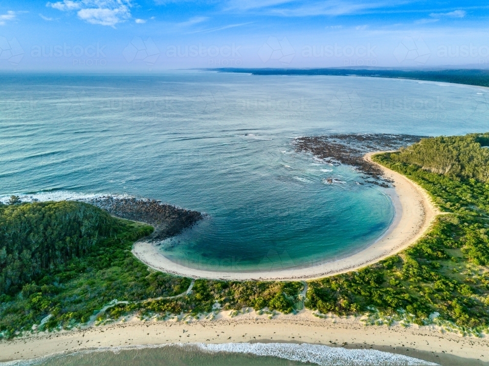 Broulee spit and the south facing beach of 350m - Australian Stock Image