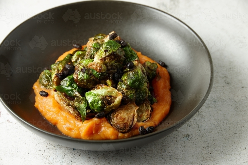 Brussel sprouts with pumpkin paste - Australian Stock Image