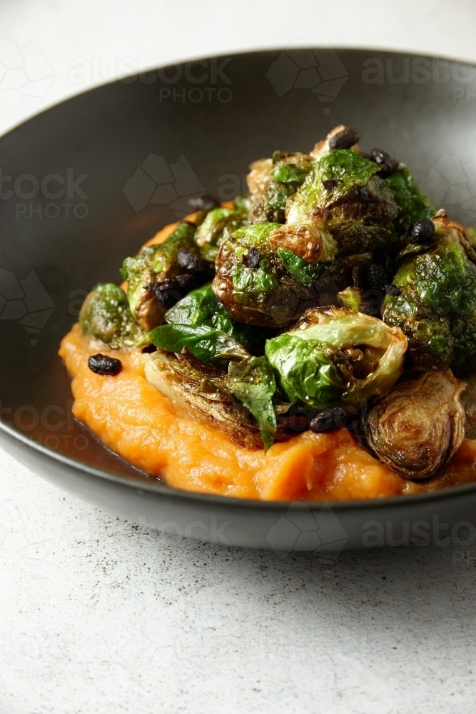 Brussel sprouts with pumpkin paste - Australian Stock Image