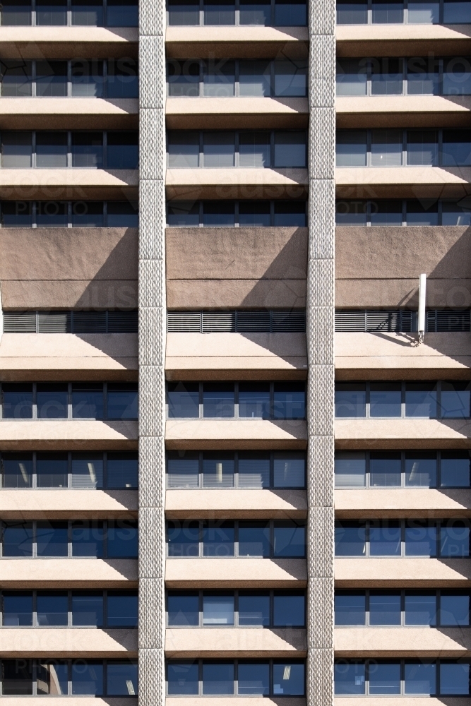 Brutalist Building Facade with Strong Shadows - Australian Stock Image