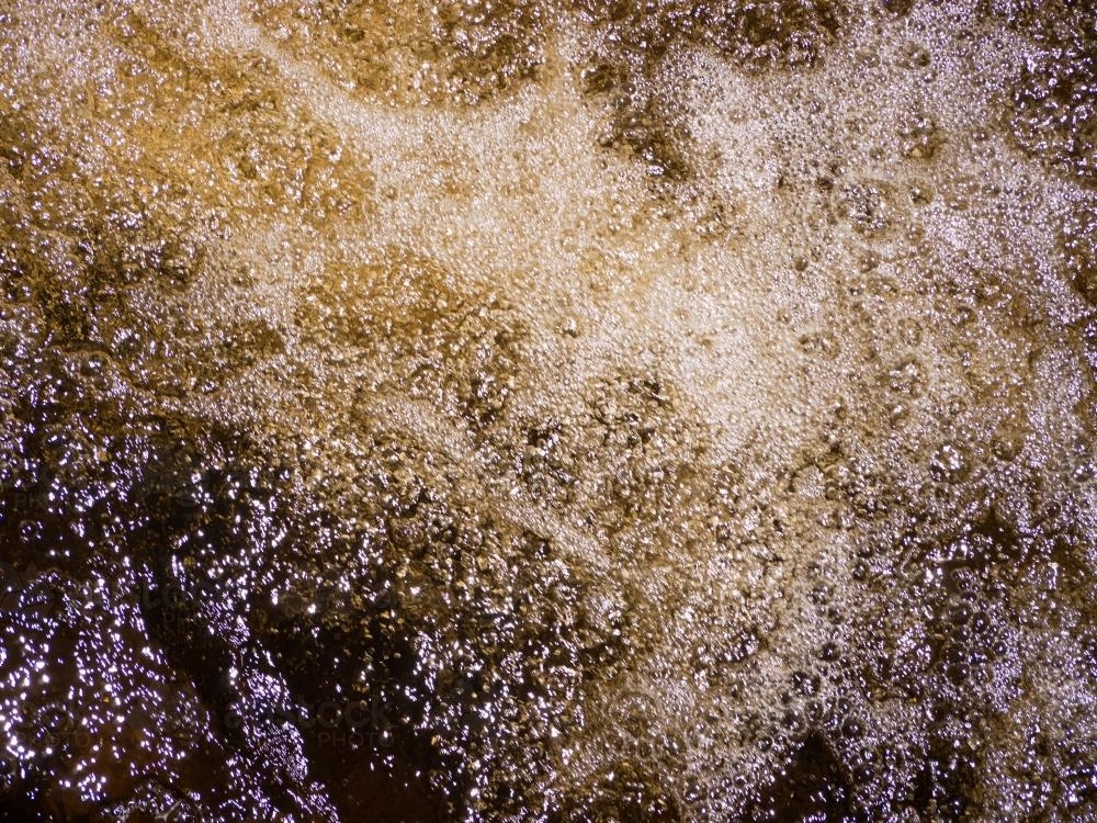 Bubbly tannin stained water - Australian Stock Image