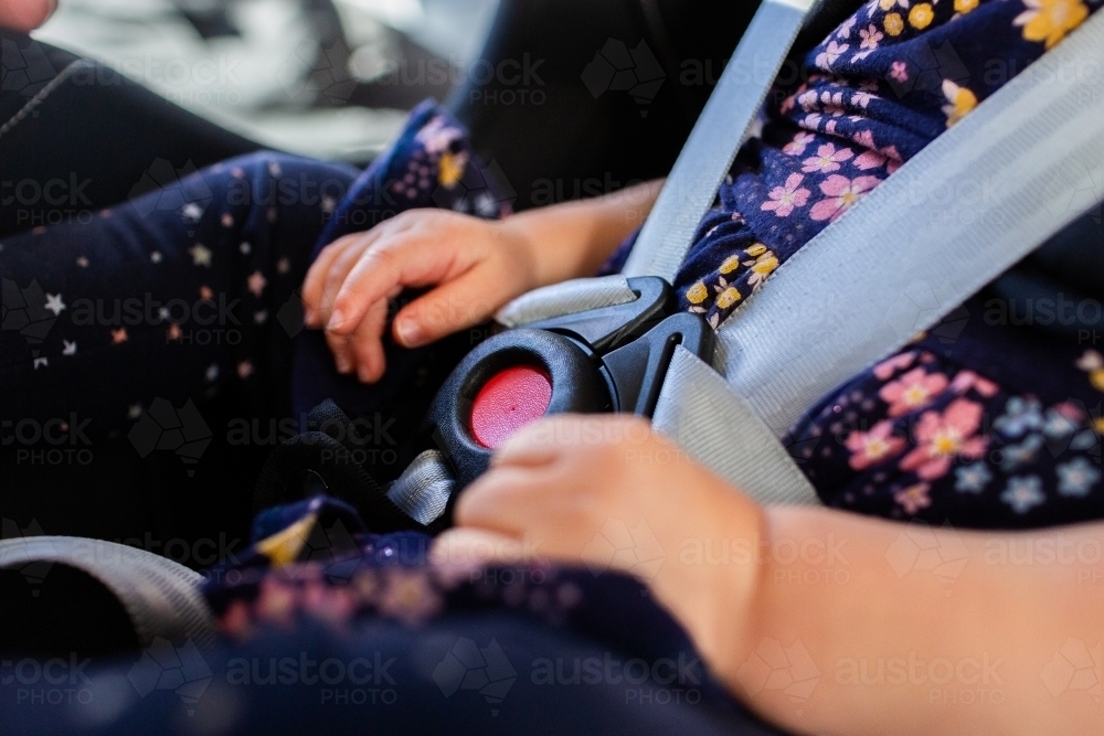 Image of Buckle and straps done up with toddler in extended rear facing