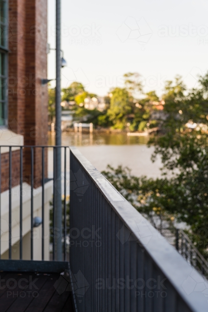 building exterior, railing and water view, Brisbane - Australian Stock Image