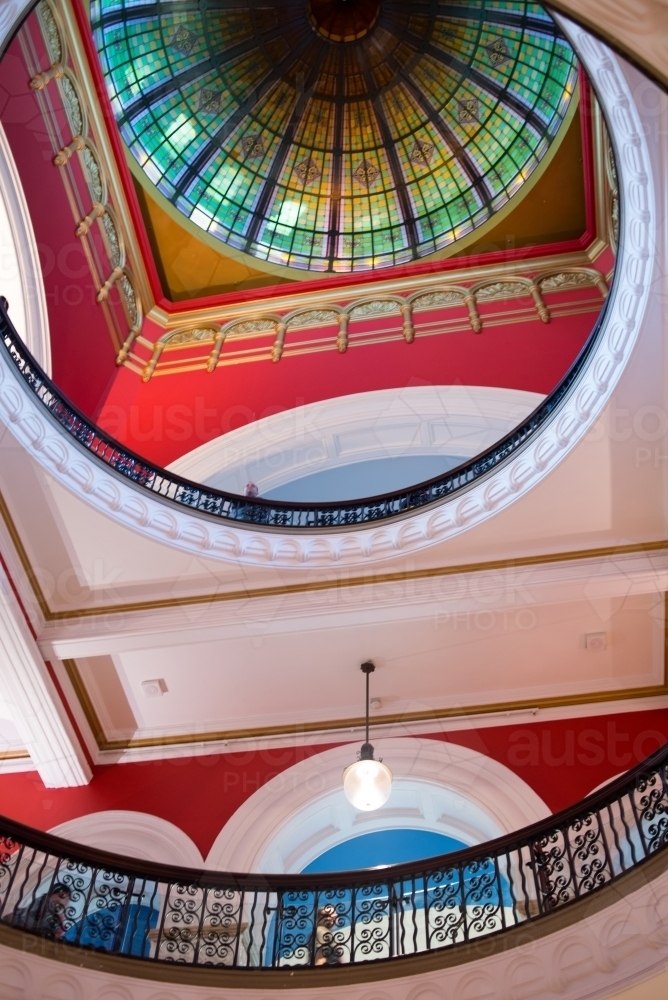 Building interior with colourful domed roof of queen Victoria building - Australian Stock Image