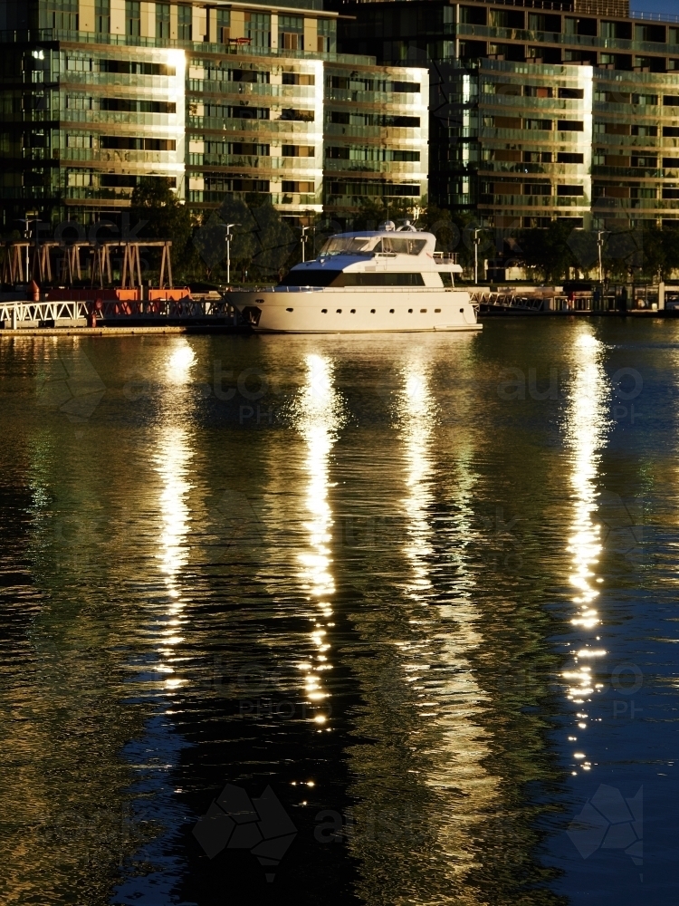 Buildings and Boat on Victoria Harbour - Australian Stock Image