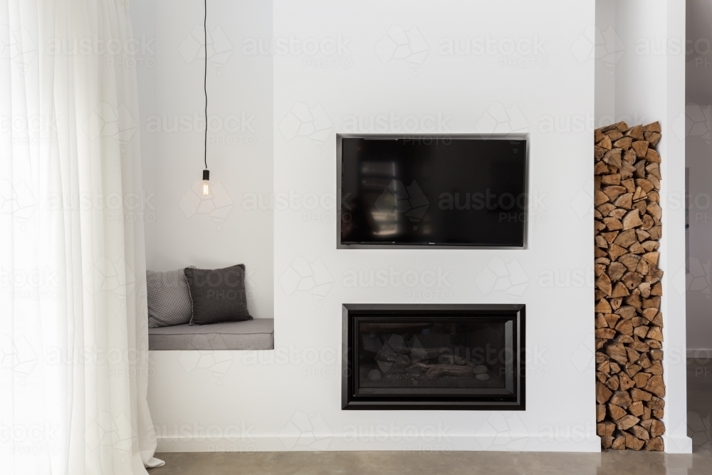 Built in tv and gas fire in a contemporary living room - Australian Stock Image