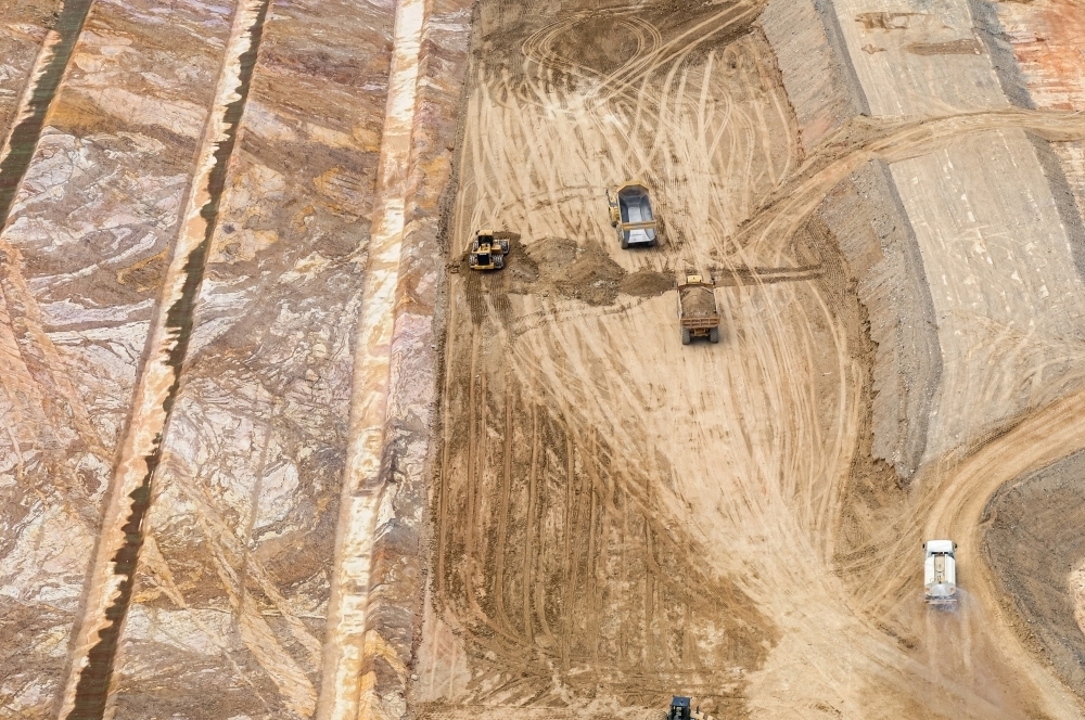 Bulldozers doing earth work on industrial construction site - Australian Stock Image