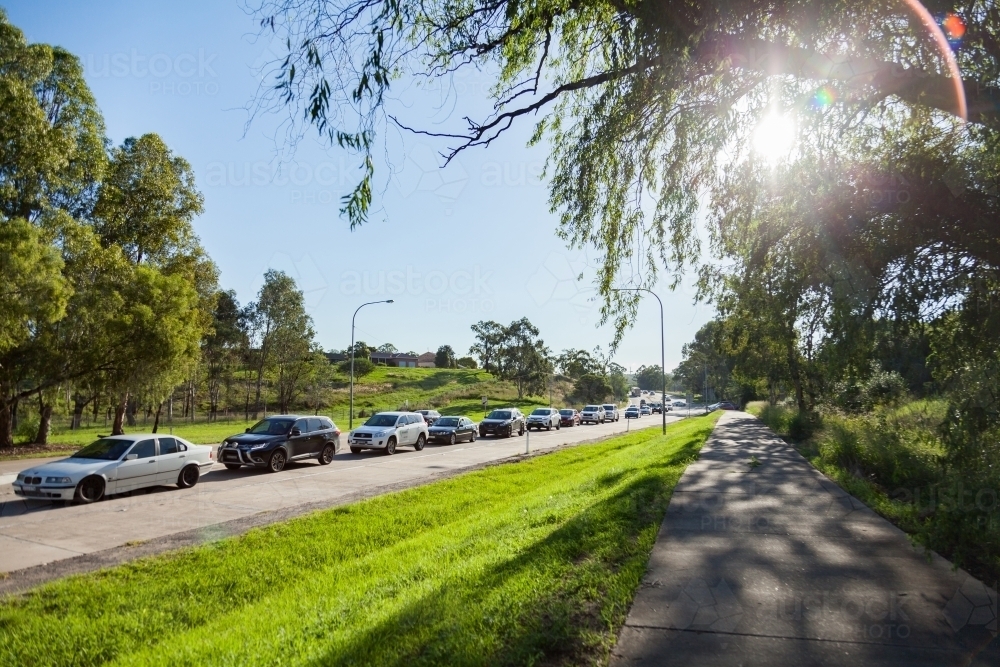 Image of Bumper to bumper traffic on highway in singleton with footpath